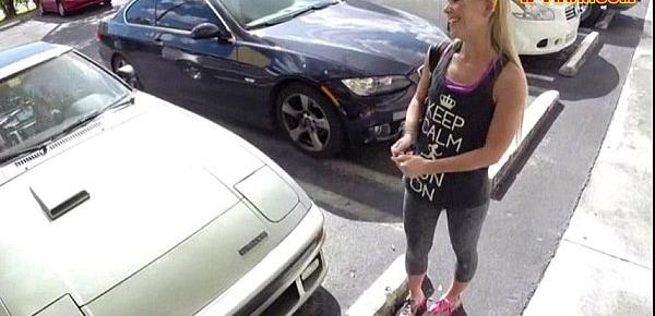  Blonde bimbo gives a road head while test driving her car